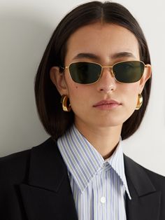 EXCLUSIVE AT NET-A-PORTER. Bottega Veneta Eyewear's sunglasses are designed with narrow square frames that evoke minimalist, '90s styles. Made from gold-tone metal, they have slim arms and green acetate temple tips to complement the shade of the lenses. Elegant Luxury Miu Miu Sunglasses, Square Face Sunglasses, The Round Up, 90s Sunglasses, Italian Sunglasses, Metal Frame Glasses, Metal Glasses, Fashion Eyeglasses, Aviator Style