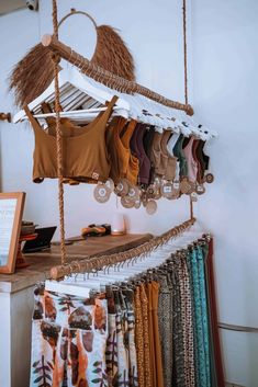 an assortment of clothing hanging from a rope