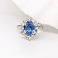 Stunning is an understatement for this ring! The all-natural diamond halo and accents perfectly emphasize the blue in this sapphire from Ceylon. The halo design gives a slightly vintage feel but in the most elegant way. This ring is now ready to ship in white gold, but can be recast to yellow or rose gold! This ring can also be a beautiful September birthstone gift for your loved ones! This ring is made with solid 14K Gold and naturally Earth-mined SI / G-H diamonds. As listed, this ring is read Cornflower Blue Sapphire, Designer Silver Jewellery, Halo Design, Blue Sapphire Ring, Jewelry Showcases, Ring With Diamond, Birthstone Gifts, September Birthstone, Blue Sapphire Rings