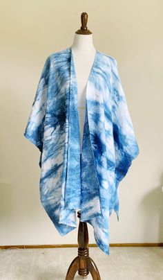 "This is a gorgeous indigo dyed linen Ruana, made of linen fabric, hand dyed using shibori technique. Its open in the front and the sides. This is perfect for layering, wear it over a sweater, long sleeved t shirt with jeans as is, or wear it with your favorite chunky belt. Wrap yourself in this soft material, use it as a blanket scarf, or a wrap shawl. This is a versatile piece of clothing that can be draped with ease, a must for your wardrobe cause you will keep reaching for this rich blue Rua T Shirt With Jeans, Chunky Belt, Long Sleeved T Shirt, Ruana Wrap, Tie Dye Kit, Indigo Tie Dye, Bohemian Kimono, Linen Jackets, Wrap Shawl