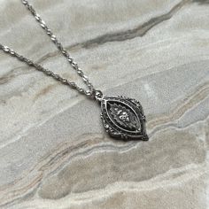 ▫️Wear your Faith beautifully and simply with this vintage inspired Sterling silver Sacred Heart Necklace  ▫️The necklace is approximately 18 inches and is finished off with a spring ring clasp closure making it the ideal length for everyday wear ▫️This Sterling Silver Sacred Heart medal is ornate and detailed and is even more stunning in person and would make an amazing confirmation or wedding gift  ▫️Your order will arrive in a gift box with a twine ribbon closure and will include a prayer car Heirloom Silver Pendant Necklace, Classic Filigree Necklace As Gift, Silver Necklace With Vintage Charm, Classic Filigree Necklaces For Gifts, Elegant Sterling Silver Jewelry With Vintage Charm, Silver Vintage Charm Classic Jewelry, Classic Filigree Necklace For Gift, White Gold Sterling Silver Jewelry With Vintage Charm, Silver Classic Necklace With Vintage Charm