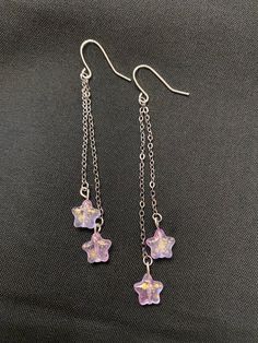 Purple Glass Star w/Gold Total length 3in Star 8x8mm Thank you so much for your interest! Feel free to ask any questions.  Check back often, I'll be adding new stuff all the time! I also have clear plastic fish hooks for sensitive ears, just send a message with your order if you would prefer those. Cute Purple Accessories, Purple Star Earrings, Cute Jewelry Making Ideas, Earrings Beaded Handmade, Making Jewelry Aesthetic, Wire Earrings Diy, Star Glasses, Purple Clothes, Star Accessories