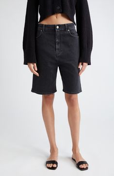 A low-rise waist and longline silhouette define nonstretch denim shorts crafted from organic cotton with a logo-embossed back patch. 8 1/2" inseam; 22" leg opening; 15" front rise; 16 1/2" back rise (size 29) Zip fly with button closure Front slant pockets; back patch pockets 100% organic cotton Machine wash, dry flat Made in Italy Designer Clothing Shorts Nordstrom, Loulou Studio, Lou Lou, Summer 24, Back Patch, Long A Line, Low Rise, Designer Clothing, Denim Shorts