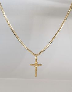 Real Gold Cross Necklace Made in Italy Guaranteed 10K Yellow GOLD, Stamped 10K This gold cross necklace is a beautiful piece for Christians for protection during uncertain times. Excellent for yourself or as a thoughtful gift to somebody you care about. 10K SOLID Gold Curb Chain: 1.5 mm, 2 mm, 3mm Choose Cross size (not including bail): Small: 30 mm x 18 mm x 4 mm Large: 45 mm x 28 mm x 5 mm Real Solid Gold Curb Chain is secured with a Solid Gold lobster clasp. Invest in SOLID GOLD: It's what's Mexican Gold Cross Necklace, Mens Gold Jewelry Necklace, Luxury Men's Crucifix Necklace, Cross Necklaces For Men, Gold Crucifix With Figaro Chain Jewelry, Yellow Gold Plated Crucifix Jewelry, Gold Box Chain Necklace For Wedding, Gold Crucifix Necklace In 14k Gold, Yellow Gold Cross Jewelry With Figaro Chain