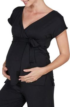 A soft, drapey pajama top is perfect for pregnancy and after with a surplice neckline for nursing. Surplice V-neck Short sleeves 96% lyocell, 4% elastane Machine wash, tumble dry Imported OEKO-TEX®–certified materials free of harmful substances Black Pregnancy, Pregnancy Band, Maternity Nursing Pajamas, Nursing Pajamas, Nursing Tops, Surplice Neckline, Vetements T Shirt, Maternity Nursing, Nursing Tshirts