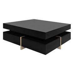 two black coffee tables with gold legs