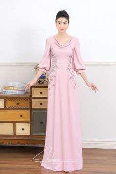 Cowl neck Material: Crepe, beading Half sleeves Type: Modern ao dai Elegant Floor-length Dresses With Embroidered Sleeves, Floor-length Evening Dress With Embroidered Neckline, Evening Dresses With Embroidered Sleeves, Elegant V-neck Dress With Embroidered Neckline, Elegant Embellished Long Sleeve Ao Dai, Elegant Pink Dress With Embroidered Neckline, Long Sleeve Dress With Embroidered Neckline For Wedding, Long Sleeve Wedding Dress With Embroidered Neckline, Elegant Formal Dress With Embroidered Neckline