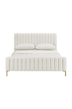 a white bed with two pillows on top of the headboard and one foot board