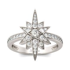 a white gold ring with diamonds in the center and an open star design on top