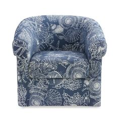 a blue and white chair with an ocean theme pattern on the back, in front of a