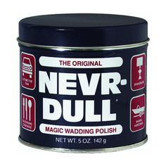 the original never dull magic wadding polish is black with red and white symbols on it