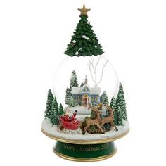 a snow globe with a christmas scene inside