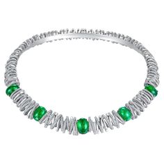 This is a statement piece highlighted with 30 carats of Muzo Green Emerald and 7.2 carats of high quality natural Diamond. This necklace is inspired by the bird nest stadium and it has a matching diamond bangle. If you love this design and wish to have it in a different main stones please contact us to customize one. Total Emerald weight is 29.97 ct Total diamond weight is 7.2 ct There are 1208 pieces diamonds graded in E/F and VS. All emerald care origin from Zambia vivid green colour and good clarity. Some of them have little cat eyes effect. Please ask for more videos and photos. This piece comes with top design, innovative craftsmanships. It is the the truely masterpiece. We made this one without using over the top gemstones. We believe high jewellery should not be about exceptional bi Emerald Bracelets, Award Design, Sparkling Jewelry, Stones Necklace, High Jewellery, Emerald Bracelet, Jewelry Brands, Cat Eyes, Expensive Jewelry