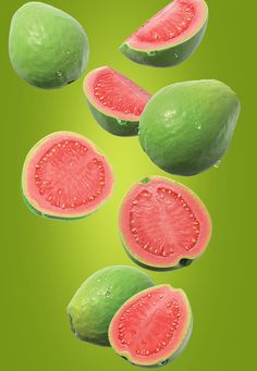 some watermelon slices on a green background