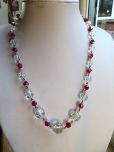 "Vintage 1940's Clear & Red Glass Bead Necklace, this necklace is nearly 20\" long with a brass roll over fastener. This clear faceted glass bead is 3/4\" wide with these pretty deep red glass beads in between the metal links, this necklace is in a good condition." Vintage Red Faceted Beads Jewelry, Vintage Red Single Strand Jewelry, Vintage Czech Glass Necklace With Faceted Beads, Vintage Red Czech Glass Jewelry, Dainty Necklace Layered, Solid Gold Necklace, Jewelry Chain, Deco Jewelry, Chain Gold