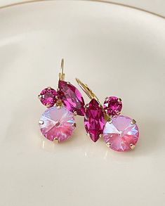 Gorgeous pair of drop earrings featuring Swarovski crystals in various shades of pink.  Shown in the gold metal finish.  Earrings are 1 1/4 inch long x 3/4 inch wide. Pink Crystal Drop Bridal Earrings, Pink Earrings With Lever Back Ear Wires For Party, Fuschia Accessories, Raspberry Wine, Hot Pink Earrings, Pink Tulle Dress, Jewelry Girl, Teal Earrings, Crystal Bridal Earrings