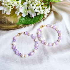 Purple Pearl Bracelet - Baroque Pearl Bracelet - Purple Bracelet - Violet - Lilac - Pastel Pearl Bracelet Item Details: ⭐ This bracelet is so simple yet on point, in trend and chic. It's made with pastel purple jade beads and baroque pearls. Another option is made with beautiful shiny purple glass beads. ⭐ This bracelet is 18cm long. You can request your own desired length if this is not the length you like.  ⭐ The bracelet is made with 18k gold-plated gold chain 💻😊 P.S. If this length is not Lavender Bracelets With Spacer Beads For Gift, Lavender Bracelets With Spacer Beads As Gift, Lavender Bracelets With Colorful Beads, Lavender Beaded Bracelets With Round Beads As Gift, Lavender Bracelet With Spacer And Round Beads, Lavender Beaded Bracelet Jewelry, Pearl Bracelets With Spacer Beads For Gifts, Lavender Beaded Crystal Bracelet As A Gift, Pearl Bracelets With Faceted Round Beads