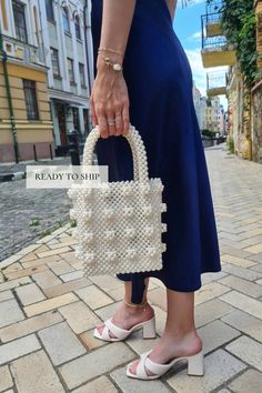 Pearl beaded tote aesthetic woman bag will decorate your usual day. Amazing evening handbag. You can add some silk lining inside the bag🤎 Bag size: *Height: 33 cm *Height without handles: 19 cm *Width: 16.5 cm *Lateral width: 10 cm *Handle drop: 14 cm *Weight: 750g Material: ivory acrylic pearl beads 8mm. With every pearl bag you'll get present🎁 In addition to the gift, a hand-signed postcard with a message from the purse is attached to the order. If this is a present, be sure to write me the name of the recipient.  More pearl bags🔥 https://www.etsy.com/shop/VitakaJewelry?ref=seller-platform-mcnav§ion_id=29560344 !!Please be aware that some countries impose customs fees and taxes for packages that enter your country.  These fees are kept by your government and outside of your purchase w Tote Aesthetic, Personalized Clutch, Casual Purse, Clear Purses, Woman Bag, Pearl Bag, Dice Bag, Bridesmaid Accessories, Evening Handbag