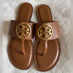 Close To Brand New, Worn Maybe 2-3 Times Was A Gift But Not Getting Much Wear Out Of Them Tan Leather Sandals With Round Toe, Tan Sandals With Leather Footbed And Round Toe, Tan Sandals With Leather Footbed, Tory Burch Bubble Slides, Tory Burch Rope Sandals, Tory Burch Charm Mules, Tory Burch Slides, Tory Burch Jewelry Gold, Orange Flip Flops