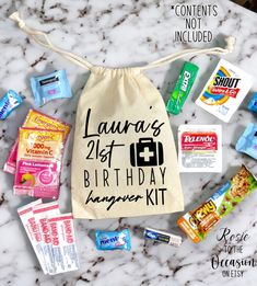 a birthday gift bag filled with snacks and candy