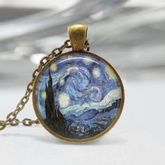 This listing is for one handmade art pendant with matching link chain. A glass dome is sealed over the artwork to protect and magnify the image, then set into a bronze or silver plated bezel. Metal is lead and nickel free.Pendant measures 1 inch (25mm) in diameter. Chain length is 24 inches long (61cm).Snake Chains are available here:https://www.etsy.com/shop/MissingPiecesStudio?section_id=14179823Ships in 3-5 business days from Tucson, AZ. All shipments will be sent first class via USPS. Please Artistic Personalized Necklace, Artistic Personalized Round Necklace, Artsy Gold Pendant Jewelry, Artistic Personalized Round Pendant Necklace, Artistic Gold Jewelry With Cabochon, Artsy Gold Round Pendant Necklace, Personalized Round Artistic Jewelry, Artistic Large Pendant Necklace For Collectors, Artistic Gold Round Jewelry