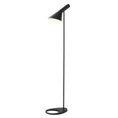 a black floor lamp with a white light on the top and an oval base underneath it