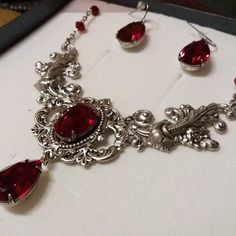 Red garnet gothic necklace deep red jewel choker victorian | Etsy Summer Court, Jewel Choker, Fantasy Jewellery, Baroque Necklace, Bridal Statement Necklace, Beautiful Pendants, Victorian Necklace, Red Jewel, Necklace Gothic