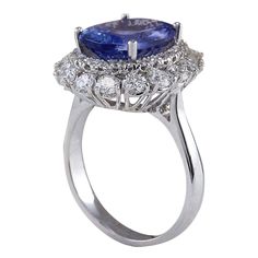 Stamped: 14K White GoldTotal Ring Weight: 5.5 GramsRing Length: N/ARing Width: N/AGemstone Weight: Total Natural Tanzanite Weight is 5.12 Carat (Measures: 12.95x9.90 mm)Color: BlueDiamond Weight: Total Natural Diamond Weight is 1.50 CaratColor: F-G, Clarity: VS2-SI1Face Measures: 10.90x16.78 mmSku: [702344W] Oval Gemstones With Halo Setting For Formal Occasions, Oval Gemstones With Prong Setting For Formal Occasions, Formal Tanzanite Halo Ring, Luxury Tanzanite Diamond Ring Gia Certified, Classic Oval Multi-stone Cluster Ring, Classic Oval Cluster Ring With Multi-stone, Luxury Gia Certified Tanzanite Diamond Ring, Elegant Gia Certified Pear-shaped Sapphire Ring, Tanzanite Brilliant Cut Formal Rings