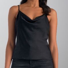 This Elan Satin Cami is crafted with luxurious satin, creating an elegantly draped neckline that falls gracefully over the chest. An exquisite piece for any wardrobe, its unstinting sophistication will captivate in any setting. Draped Neckline, Satin Cami, Black Camis, Unique Outfits, Black Media, Womens Tops, Satin, Wardrobe, Black