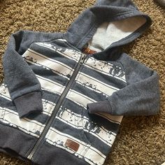 Seven Baby Blue White Striped Zip Up Hoodie Size 12m Light Wear Cotton Hoodie With Adjustable Hood For Playtime, Cotton Hoodie Sweatshirt For Playtime, Cotton Hoodie For Playtime In Fall, Blue Hooded Top For Playtime, Casual Hoodie Top For Playtime, Blue Cotton Hoodie For Playtime, Cotton Playtime Hoodie Outerwear, White Cotton Hoodie For Playtime, White Cotton Hoodie For Casual Wear