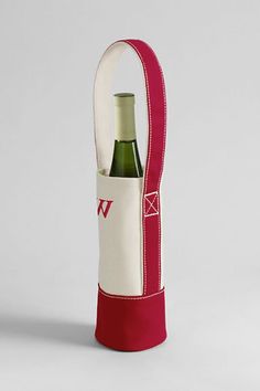 a bottle holder with a wine bottle in it