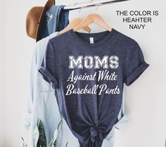 "Moms Against White Baseball Pants Shirt, Baseball Mom Shirt, Baseball Mama Shirt Welcome to my store :) ❤️ HOW TO ORDER 1. Choose the t-shirt size from the style bar (First dropdown menu) 2. Choose the t-shirt color (Second dropdown menu) 3. Select quantity as needed 4. Click \"Add to cart\" ❖ If you are purchasing more than one shirt, simply complete this process as many times as needed. SIZING ❖ Please make sure to scroll through the photos to see our size chart. You will see the detailed measurements on the chart. ❖ The shirts are UNISEX fit. We usually get feedback from buyers as they are true to size, however since every person's shape and opinion can vary, the size chart is the best way to know what size you need! ❖ If you are not sure about sizing please measure your favorite t-shi Moms Against White Baseball Pants Shirt, Mom Baseball Shirt, Baseball Mom Shirt, Funny Baseball, Combination Fashion, Navy Mom, Baseball Humor, Baseball Mama, Baseball Mom Shirts