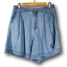 Gap High Rise Pleated Chambray Shorts With Washwell Blue Size 12t Size : 10 Tall Condition : New With Tags Noticeable Flaws : None Waist : 32" Inseam : 5.5" Leg Opening : 17.5" Rise : 14" All Measurements Are Approximate Features : High Rise, Zip Fly, Concealed Hook & Bar Closure, Blue Chambray, Elasticized Waist, Pleated Front, Front Slant Pockets, Back Welt Pockets, Long Shorts, Belt Loops, Mom Shorts, Casual Denim Look Gap Cotton Medium Wash Shorts, Gap Denim Blue Cotton Bottoms, Gap Denim Blue Summer Bottoms, Summer Gap Denim Blue Bottoms, Gap Blue Jean Shorts For Summer, Summer Denim Blue Gap Bottoms, Blue Wide Leg Jean Shorts, Blue Wide-leg Cotton Jean Shorts, Gap Denim Shorts With Pockets