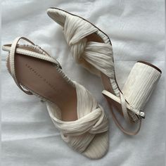 Loeffler Randall - Retails For $395 Worn Once For A Wedding, Super Comfortable For Heels! Pleated Heeled Sandal In Ivory Pearl Fabric With Knot, Open Toe With Adjustable Buckle Ankle Strap. 3.5 Inch Heel. Elegant Spring Wedding Shoes With Stacked Heel, Cream Open Heel Wedding Shoes For Spring, White Wedding Shoes With Stacked Heel For Evening, Chic Cream Heels For Gala, Feminine Cream Heels With Wrapped Heel, Cream Feminine Heels With Wrapped Heel, Chic Wedding Shoes With Stacked Heel, Chic Beige Block Heel Wedding Shoes, Chic Evening Wedding Shoes With Stacked Heel