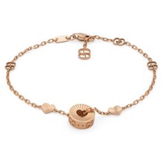 From Gucci, this precious bracelet is presented in 18k rose gold with a delicate chain that features the GG motif. Reflecting the romantic narrative that runs through the House's designs, the piece is defined by an intricate charm with a cut-out heart. 18k rose gold Charm with cut-out heart GG motif Clasp closure Adjustable length: 6.3" or 7" Made in Italy Gucci guarantees, internally and within its supply chain, respect for standards of Social & Environmental Responsibility in lin Wedding Day Jewelry, Rose Gold Charms, Heart Rose, Engagement Ring Guide, Diamond Supply, Gold Models, Delicate Chain, Rose Gold Bracelet, Ring Size Guide