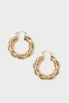 Loeffler Randall Atticus Large Twisted Hoops in gold-plated brass. 100% Gold-Plated Brass. Gold Metal Jewelry With Gold-tone Hardware, Gold Jewelry With Gold-tone Hardware In Brass, Gold Plated Hoop Earrings With Gold-tone Hardware, Gold-plated Hoop Jewelry With Gold-tone Hardware, Gold Plated Hoop Jewelry With Gold-tone Hardware, Atticus, Loeffler Randall, Sale Event, Hoop Earrings