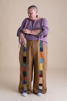 Stand out in our Patchwork Sunset Pants—a one-of-a-kind masterpiece crafted from a collection of cotton and linen fabric scraps we've carefully saved throughout the year. These unique pants are perfect for transitioning effortlessly between summer and fall, and back again. Stripe colors/fabrics will vary. Features: One-of-a-Kind Design: Each pair is a unique patchwork of carefully selected fabric scraps. Versatile Styling: Ideal for shifting seasons, blending summer ease with autumn warmth. Pull Patchwork Clothes Scrap Fabric, Patching Clothes, Quilt Pants, Patches Pants, Sew Upcycle, Functional Outfits, Between Summer And Fall, Costume Department, Baggy Fashion