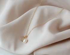 Pearl Initial Necklace alphabet mother of pearl letter necklace gold initial birthday gift dainty necklace delicate elegant gift for her. A pearls necklace is a timeless, classic and elegant gift that will always be in style. The perfect birthday gift for Mom, Grandma or anyone special in your life.  This pearl necklace is sure to please anyone on your list. If you're looking to get something special for someone who likes to keep it classy, this pearl necklace makes a great choice. ⭐︎ Details: ♡ Elegant Initial Pendant Necklace For Mother's Day, Elegant Initial Necklace With Delicate Chain For Mother's Day, Elegant Initial Pendant Necklace With Birthstone, Elegant Gold Initial Necklace With Birthstone, Elegant Mother's Day Initial Necklace With Delicate Chain, Elegant Pearl Necklace With Initial Pendant And Pearl Charm, Elegant Initial Necklace With Birthstone For Mother's Day, Elegant Initials Charm Necklace As Gift, Personalized Elegant Initial Necklace For Birthday