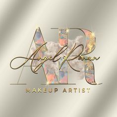 the logo for art makeup artist with gold letters and clouds in the sky behind it