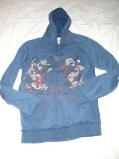 The item for sale is a Heritage 1981 hooded sweatshirt in blue with a design on the chest. It is pre-owned, but is in good shape. It is a size L and retailed for about $55 in the stores. It is made by Heritage and is 100% cotton. This item is being sold as is per the pictures..  Please check out my other auctions for more sizes, styles and colors available. Combined shipping available for multiple items. Please feel free to ask any questions regarding all items listed. Hooded Sweatshirt, Hooded Sweatshirts, Athletic Jacket, Feel Free, Sweatshirts, For Sale, Blue, Color, Design