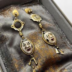 Italian antique Pierrot earrings,aged venetian style silver jewelry,handmade ebony mime masks,handpainted artisan pendants,perfect present, made to order The main elements of the earrings are handmade and hand-painted masks of Pierrot or one of the characters of the Italian commedia dell'arte.  Materials used: 925 silver, partially gold-plated. Two original, company-made connectors, one solid, the other with an empty space inside. Open clasps, with a zirconia set in them. Masks made of ebony, ha Painted Masks, Silver Jewelry Handmade, Mask Making, Jewelry Handmade, Wedding Shop, Jewelry Earrings Dangle, 925 Silver, Dangle Drop Earrings, Silver Jewelry