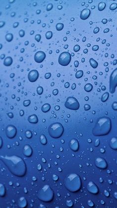 drops of water on a blue surface