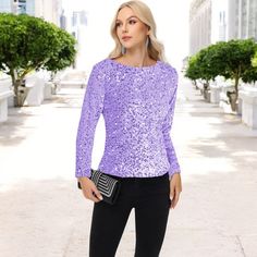 Elevate your style with the Anna-Kaci Women's Sequin Blouse, a perfect blend of elegance and glamour. This long-sleeve top is covered in shimmering sequins, making it ideal for special occasions or a night out. The round neck and comfortable fit ensure ease of wear, while the sparkle detailing adds an eye-catching finish to your outfit. Pair it with jeans for a chic casual look or dress it up with a skirt for a more sophisticated ensemble. Perfect for standing out in any crowd, this top brings a Long Sleeve Sequin Top, Sparkle Blouse, Party Blouse, Sparkle Top, Sequin Blouse, Long Sleeve Sequin, Elegant Blouses, Chic Casual, Top Round