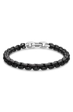 A matte black finish overtakes the chunky box links of this sterling silver chain bracelet secured by a polished stainless steel push-clasp closure. Push-clasp closure Stainless steel/sterling silver/PVD Made in Germany Elegant Black Link Chain Bracelet, Modern Black Oval Link Jewelry, Modern Gunmetal Chain Bracelet With Solid Link Construction, Black Chain Link Jewelry With Solid Construction, Black Jewelry With Rectangular Box Chain Links, Elegant Black Chain Bracelet With Silver Chain, Modern Black Chain Link Jewelry, Modern Gunmetal Link Bracelets, Modern Gunmetal Chain Bracelet