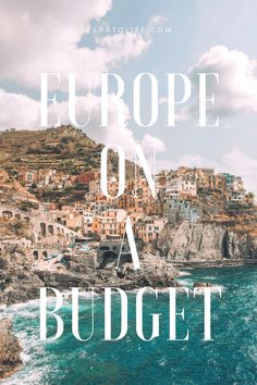 the words europe on a budget written in white over an image of a coastal town