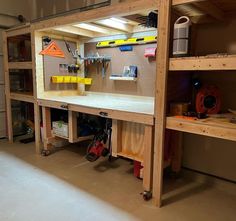 a workbench with tools on it in a garage