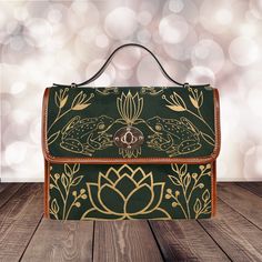 "► ABOUT THIS PURSE Colors: Green, gold, brown Design: frogs, flowers, flies, moths, leaves The design is printed on all sides using regular ink (not metallic, not glitter) in a gold color. The handle and trim are brown. The background is a mottled dark green. * Made from high-grade waterproof canvas, durable, water-resistant * Can be used as a nice laptop iPad storage bag, business briefcase, college school bag, leisure travel tote bag, crossbody messenger bag, card wallet case, etc. * Two inte Green Adjustable Shoulder Bag For Everyday Use, Adjustable Green Shoulder Bag For Everyday Use, Brown Canvas Shoulder Bag As Gift, Green Tote Satchel For Gift, Canvas Satchel Bag As Gift, Adjustable Green Bags For Everyday Use, Adjustable Green Bag For Everyday Use, Green Canvas Shoulder Bag Gift, Canvas Crossbody Bag For Gifts