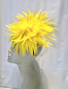 Yellow Fascinator- Wedding- Cocktail Hat -Feather Headdress- Derby Hello, This feather fascinator is about 8 inches round.  It is attached to a skinny adjustable headband that is wrapped in satin and is very comfortable.  Available in many colors. I am based in the NYC metropolitan area where I started with a shop in Soho.  I make quality accessories using the best fabrics, trims and I love to incorporate vintage items in my creations.  -------------------------------------------------- To retur Yellow Fascinator, Fascinator Wedding, Yellow Feathers, Burlesque Costume, Rio Carnival, Feather Fascinator, Feather Headdress, Feather Fascinators, Feather Headband