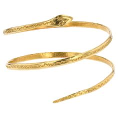 Bracelet in 18 karat yellow gold. Antique gold bangle bracelet, it represents a snake which is wound with double turn around the wrist, the top is engraved on the whole of the bracelet. Interior circumference : 19 cm approximately, width : 4 mm approximately, thickness : 1,6 mm approximately. Total weight of the jewel : 39,9 g approximately. Authentic antique jewelry - Work of the 1960s. Our opinion : flexible, this antique gold snake bracelet can be stretched or tightened according to the circu Antique Gold Bangle, Retro Bracelet, Gold Armband, Snake Jewelry, Snake Bracelet, A Snake, Gold Snake, Gold Bangle Bracelet, Gold Bangle