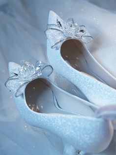 Bridal bow heels are a type of shoe that is specifically designed for a bride to wear on her wedding day. The bow is often made of the same material as the shoe and can be adorned with sparkling crystals or other embellishments to add a touch of glamour and femininity to the bridal ensemble. These shoes are a romantic and playful option for a bride who wants to add a touch of whimsy to her wedding day look. Crystal chain embellishment lampskin Pointed toe Stiletto heel Heel height measures: 60mm Bridal Bow, Handmade Jewlery, Crystal Heels, Bridal Heels, Winter Wonderland Wedding, Bow Heels, Crystal Chain, Romantic Style, Sparkling Crystal